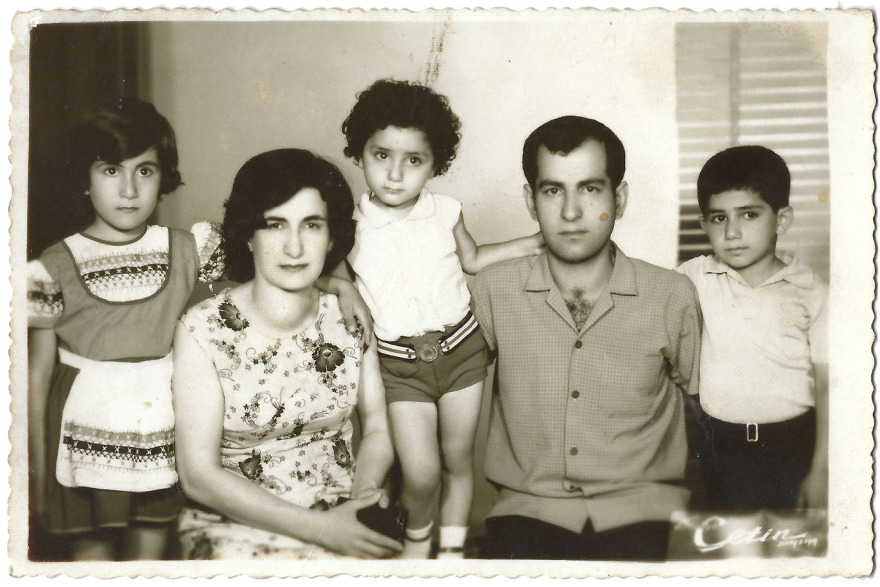 This photograph of Jaklin Çelik and her family was taken at Foto Çetin, during their first visit back to Diyarbakır, three years after they had left in 1970. From left to right, her elder sister Hilda, her mother Mari who inspired this piece, Jaklin Çelik, her maternal uncle Davut Bakırel and her elder brother Can.