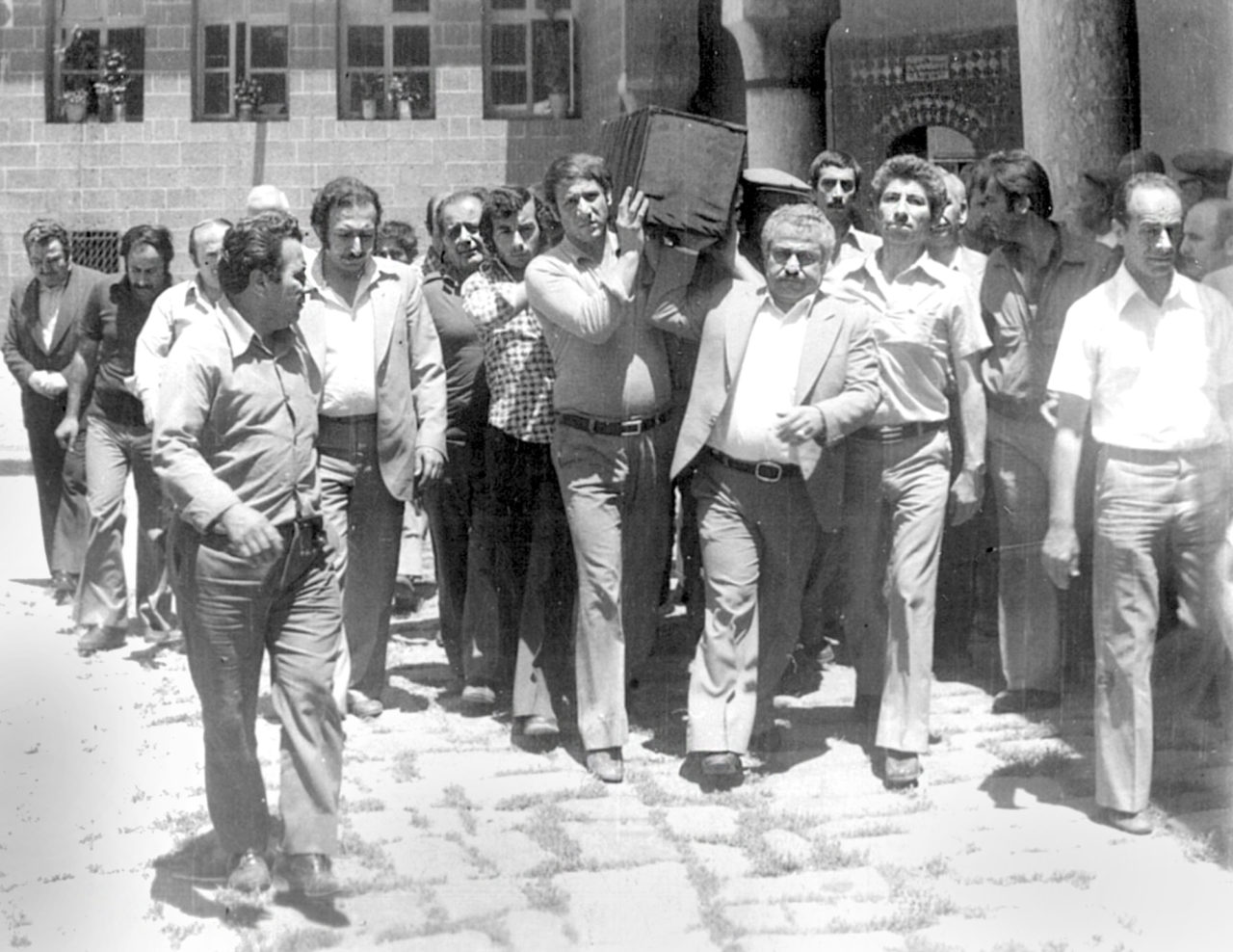 This photograph is from the Virgin Mary Assyrian Church in Sur: A funeral procession leaves the courtyard. (Photograph: The Can Şakarer archive)